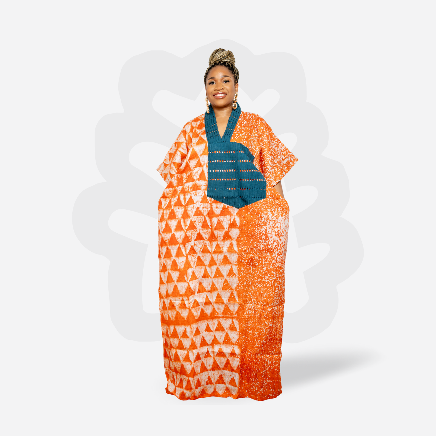 Orange Adire Kaftan Bubu with green hand woven Aso oke neck detail