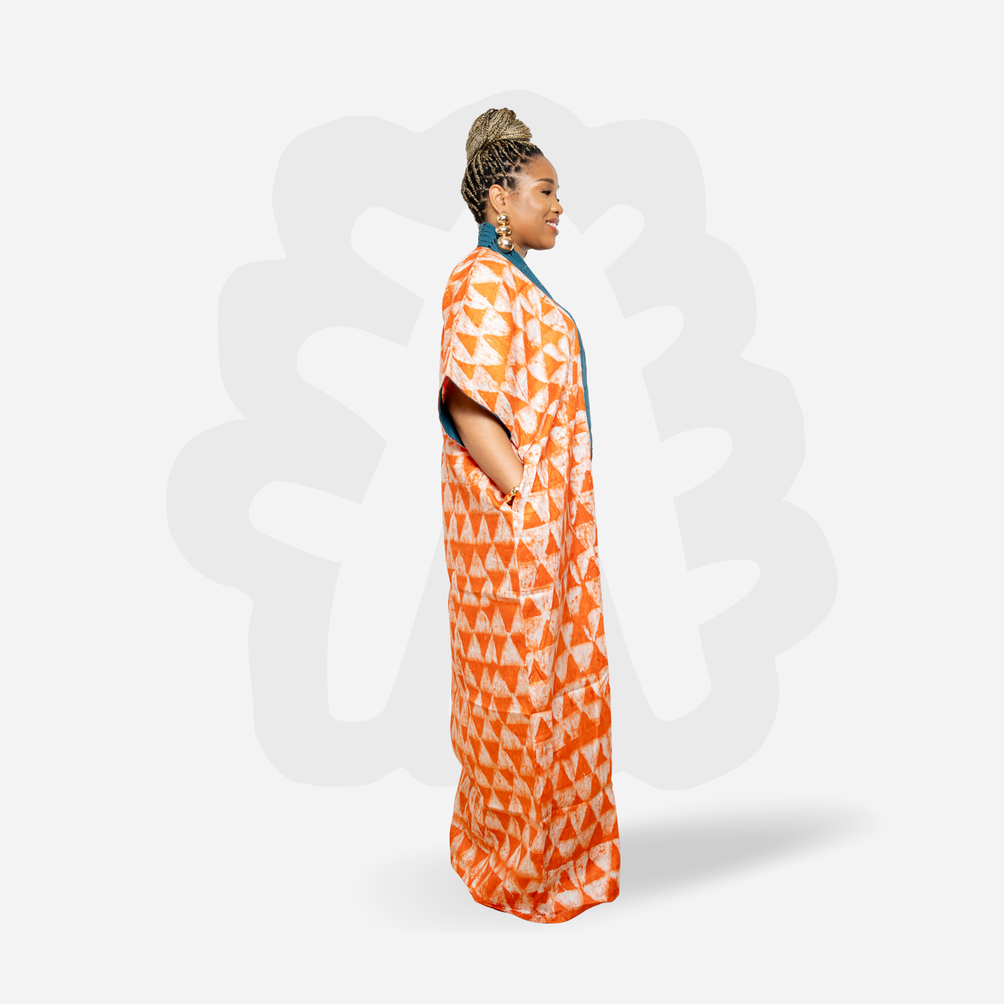 Orange Adire Kaftan Bubu with green hand woven Aso oke neck detail