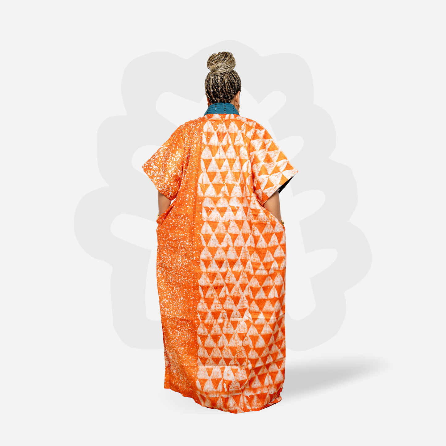 Orange Adire Kaftan Bubu with green hand woven Aso oke neck detail
